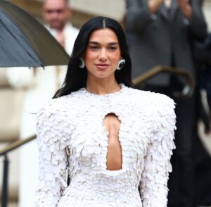 Dua Lipa Accepts Avian Couture at Schiaparelli’s Paris Show