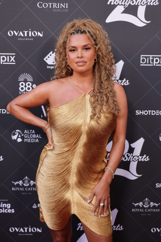 Joy Taylor Debuts Liquid Gold Dress at HollyShorts Joy Taylor