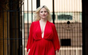 Pixie Lott attends London outing in flowing red gown
