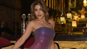 Nikki Tamboli Radiates Glamour in a Sunset-Hued Sequin Dress