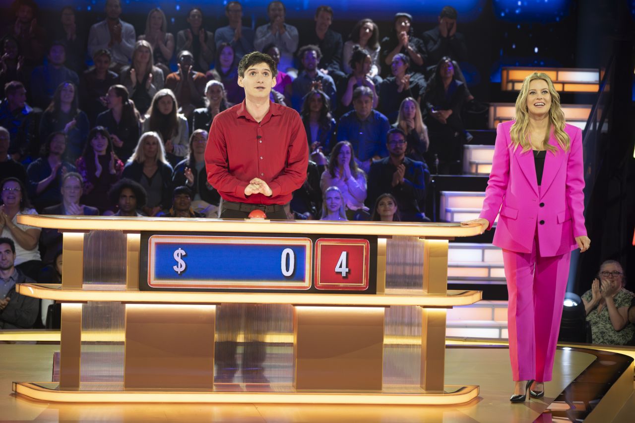 Elizabeth Banks Unveils Whiplash Pink Power Suit