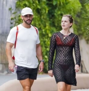 Emma Watson Walks Her Own Path in a Sheer Lace Dress