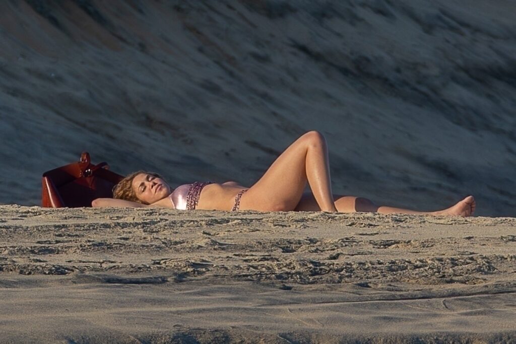 Shakira shows off her curves in metallic pink bikini during Mexican getaway