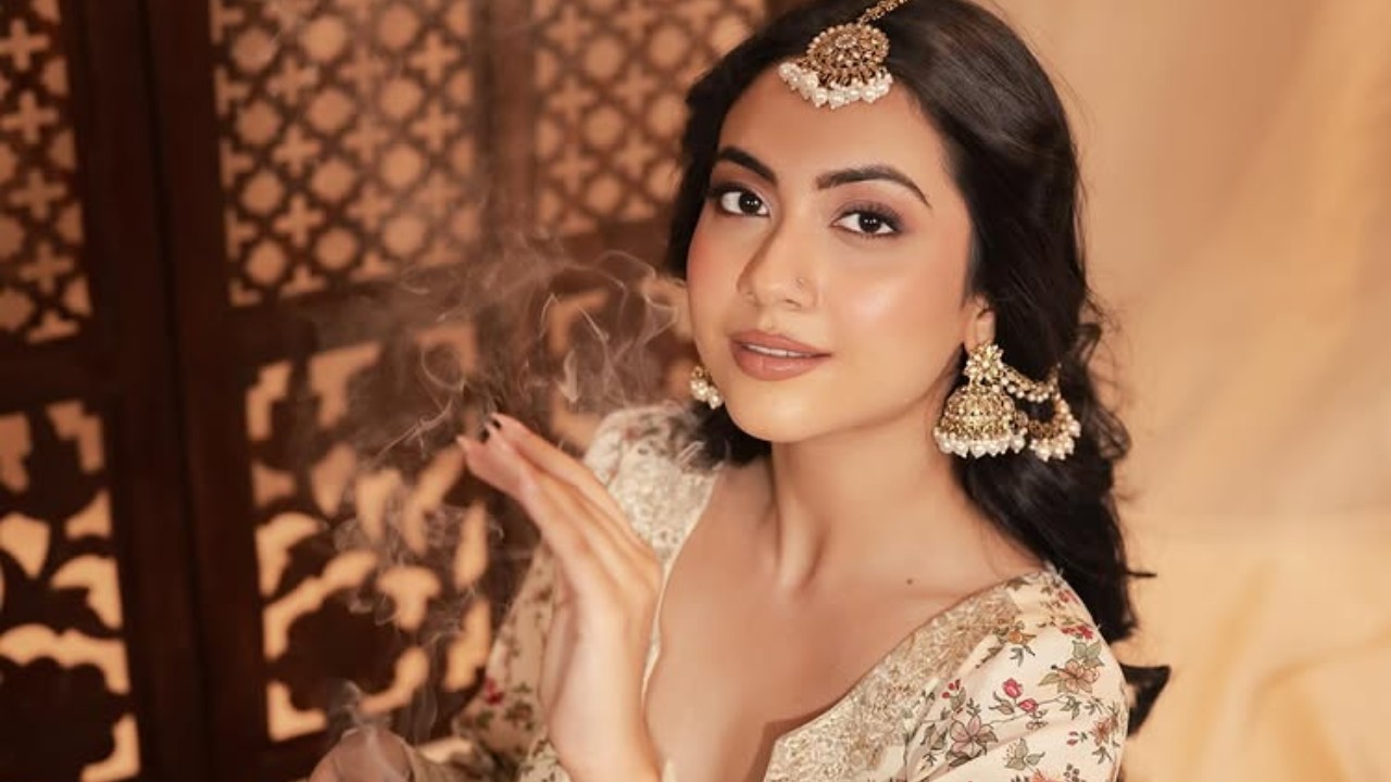 reem shaikh glows in ivory floral anarkali and regal pearl jewels