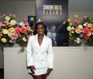 Simone Biles Debuts Pinstripe Power at Netflix Dinner