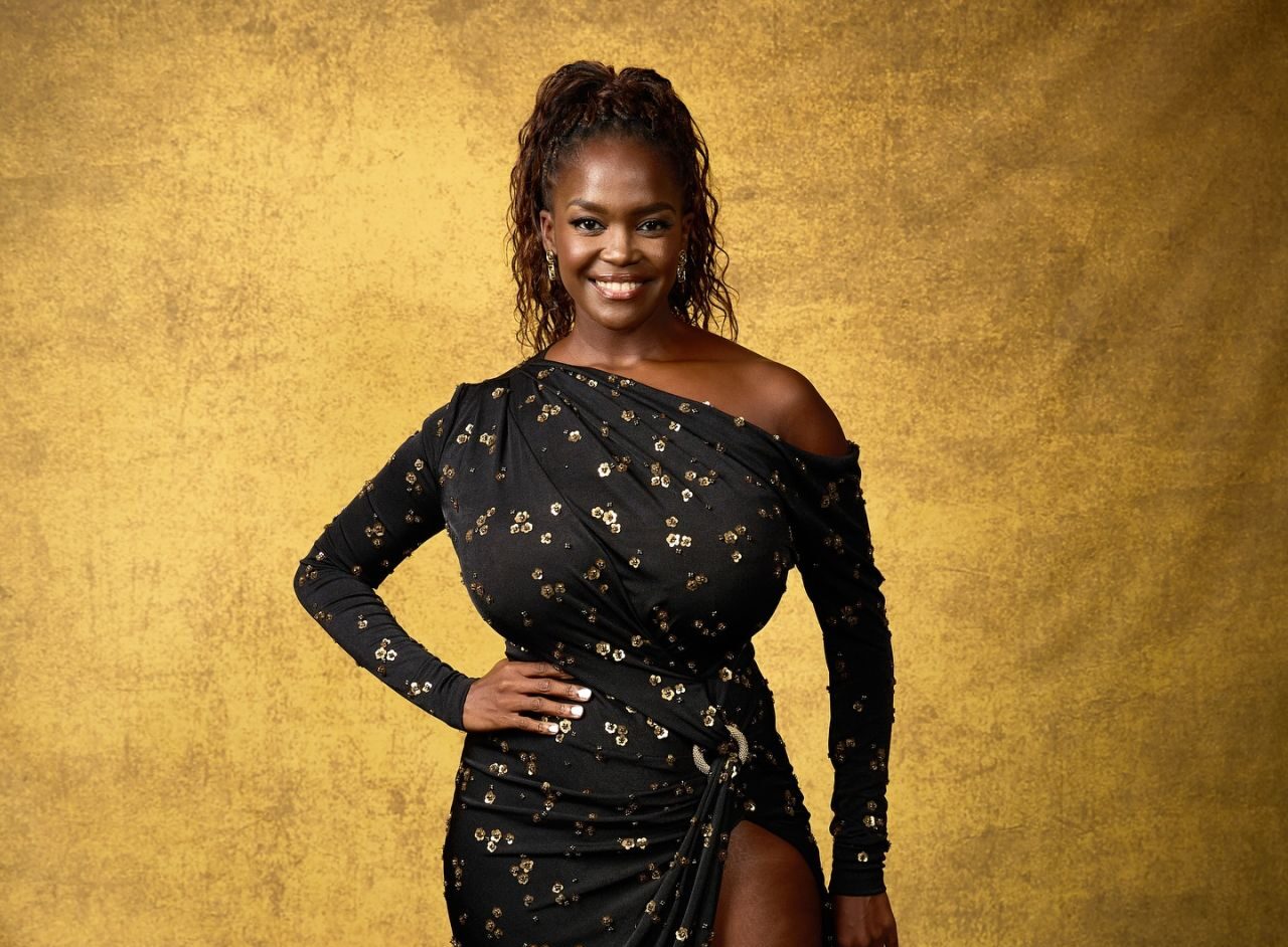 Oti Mabuse Unveils Gilded Noir Elegance at Hello Mag Feature