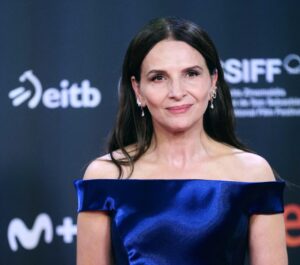 Juliette Binoche Wears a Sculptural Metallic Gown to Win for San Sebastian