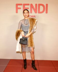 Lily Chee Leads Fendi Show in Sheer Lace and Regal Fur Stole