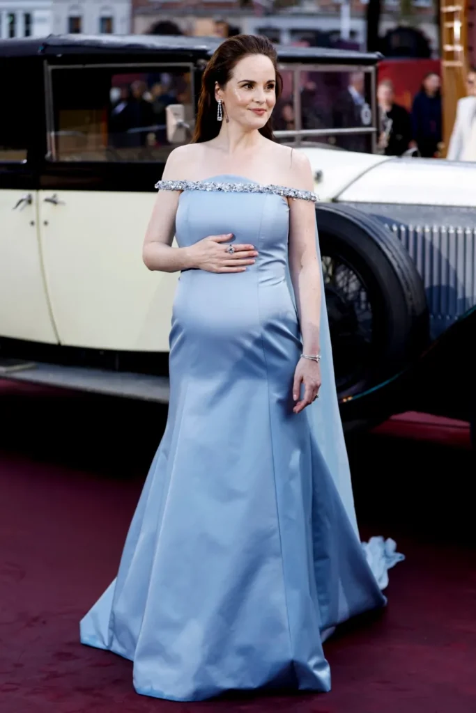 Michelle showed off her blossoming baby bump