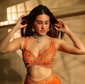 Amyra Dastur Is Gorgeous in a Bright Orange Outfit