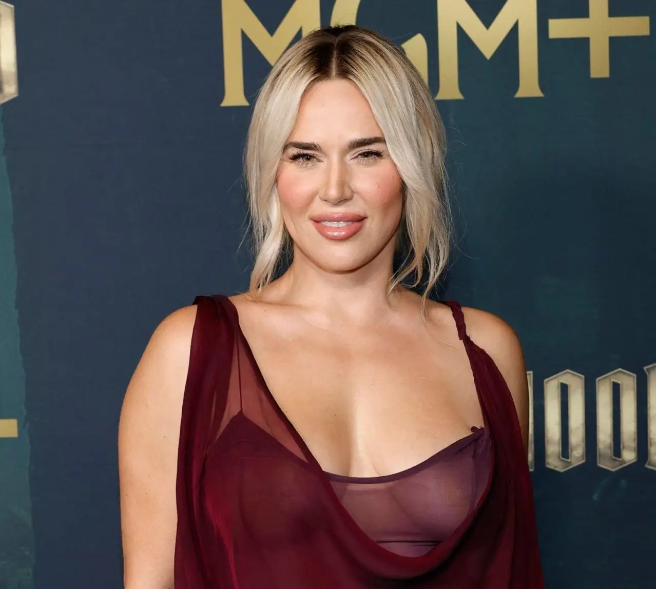 CJ Perry in Burgundy Sheer Gown at Robin Hood Premiere