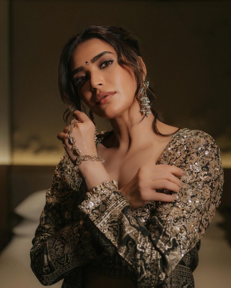 Karishma Tanna Exemplifies Opulence in Black and Gold