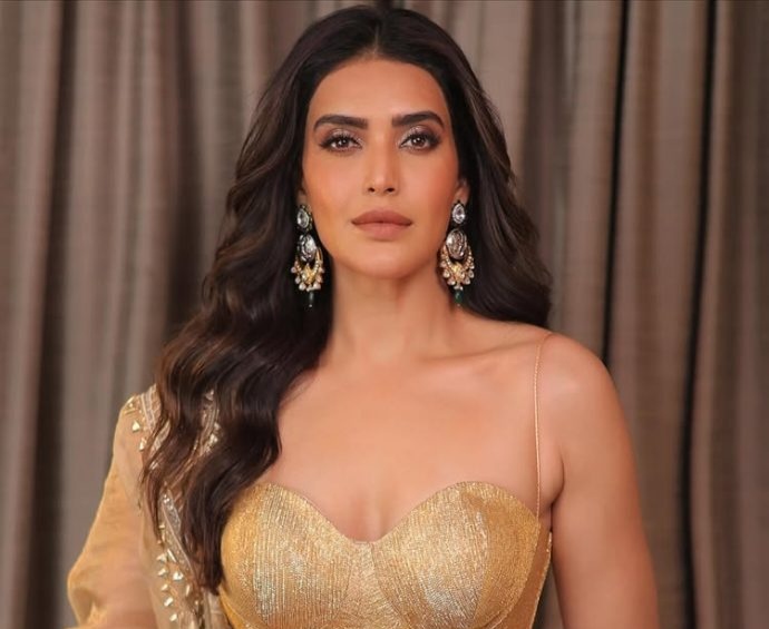 Karishma Tanna Shines in a Regal Golden Ensemble Karishma Tanna Shines in a Regal Golden Ensemble.