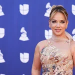 Adamari López dazzles in a spectacular gold dress at the Latin Grammys